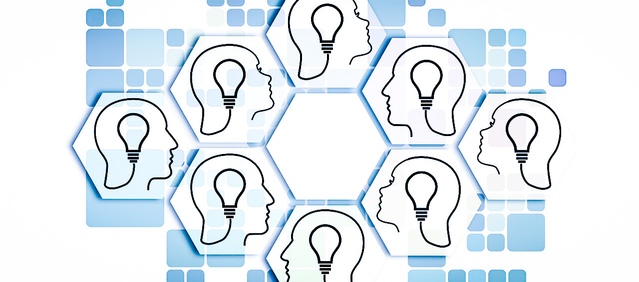 the power of collaboration graphic of several peoples heads with lightbulbs inside them, symbolising the power of collaboration